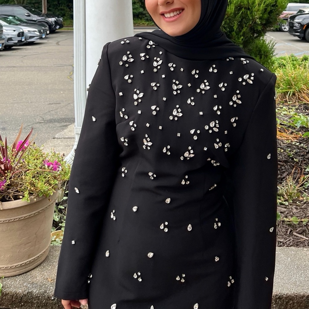 Elegant Black Dress with Pearl Embellishments